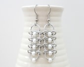 Chainmaille earrings with pearly white beads, Centipede weave