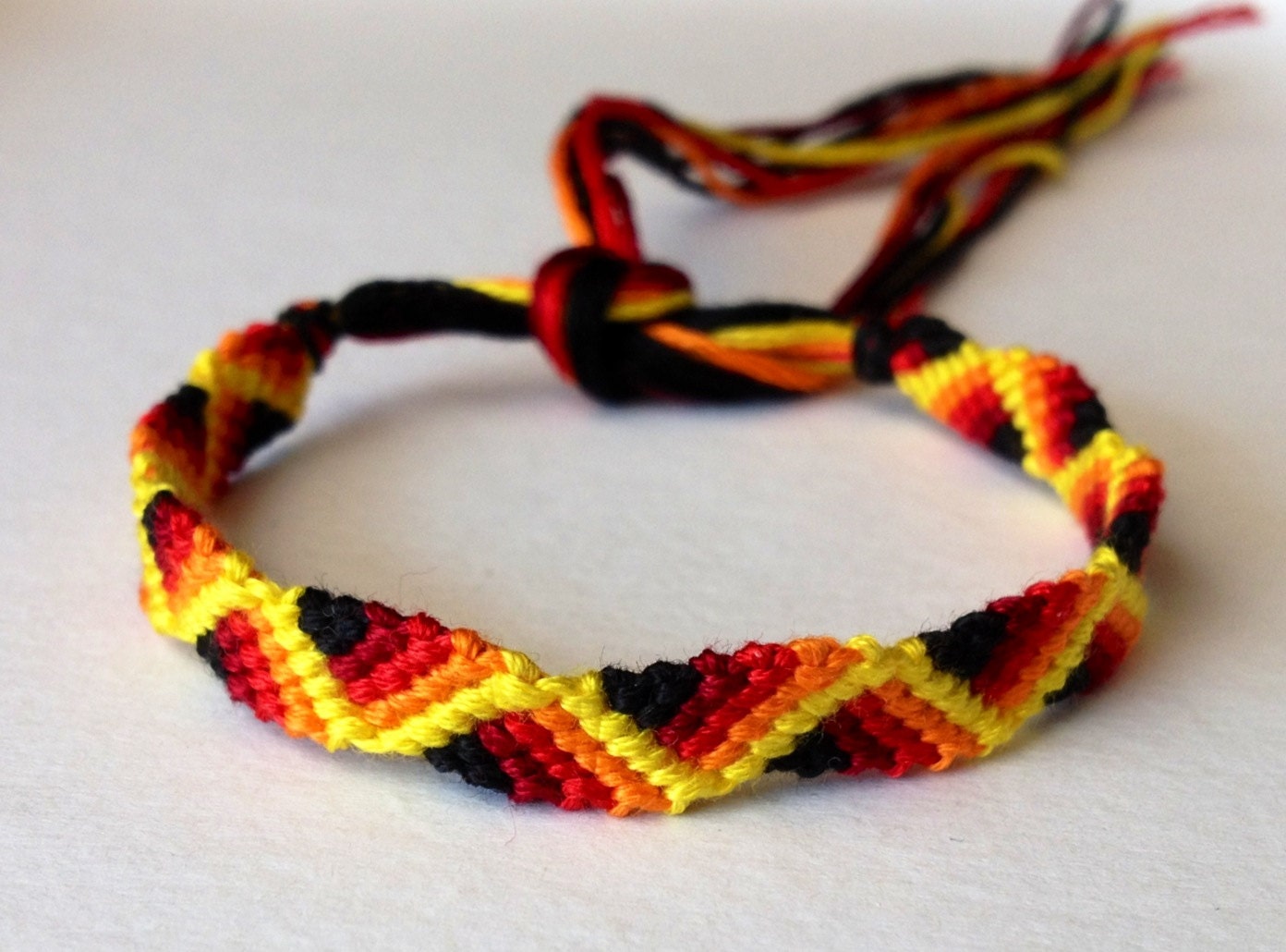 Yellow, Orange, Red & Black Zig Zag Friendship Bracelet