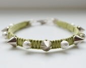 Light green and silver spike woven bracelet