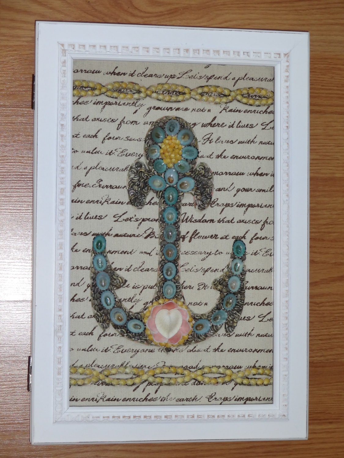 Handmade framed seashell anchor