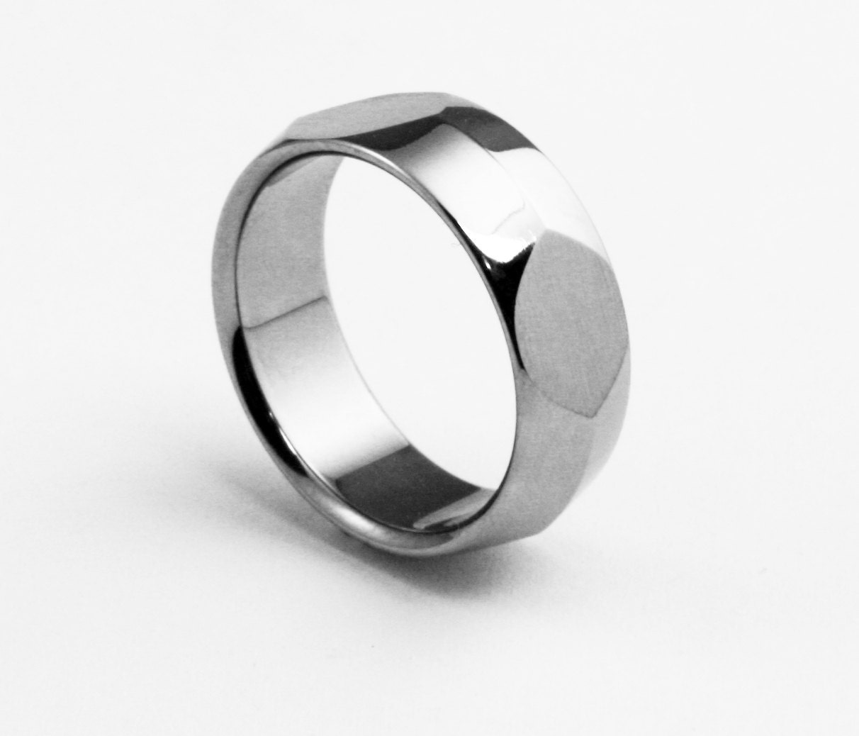 Titanium Ring with Peaked Profile and Four Side Cutouts "Crucible"