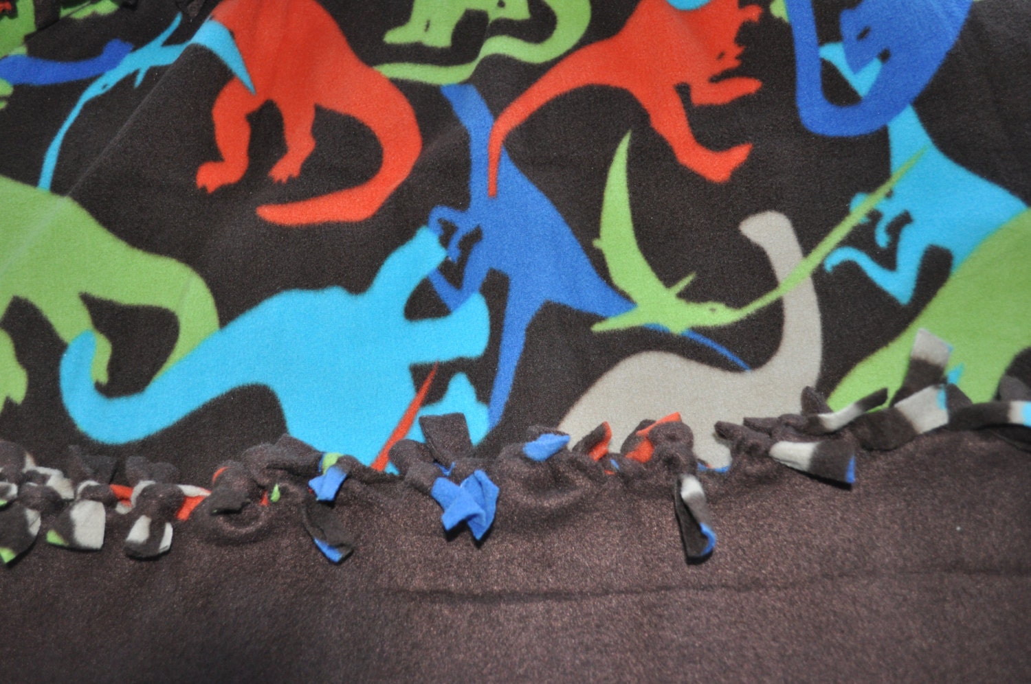 Dinosaur brown tie/fringe fleece blanket with brown background for toddler, ready to ship