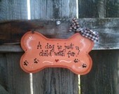 A dog is just a child with fur doggy lovers wall hanger plaque wooden sign bone shape