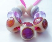 Wells of silver  - handmade lampwork bead set