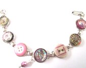 Antique button bracelet, 1800s buttons, intricate glass buttons, silver links. One of a kind