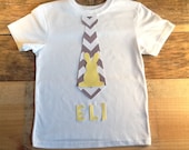 Personalized boys Easter tie shirt. 2 grey white chevron. Yellow bunny & name applique. Custom children's clothing by EverythingSorella