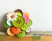 Multicolored Buttons with Flower Accent