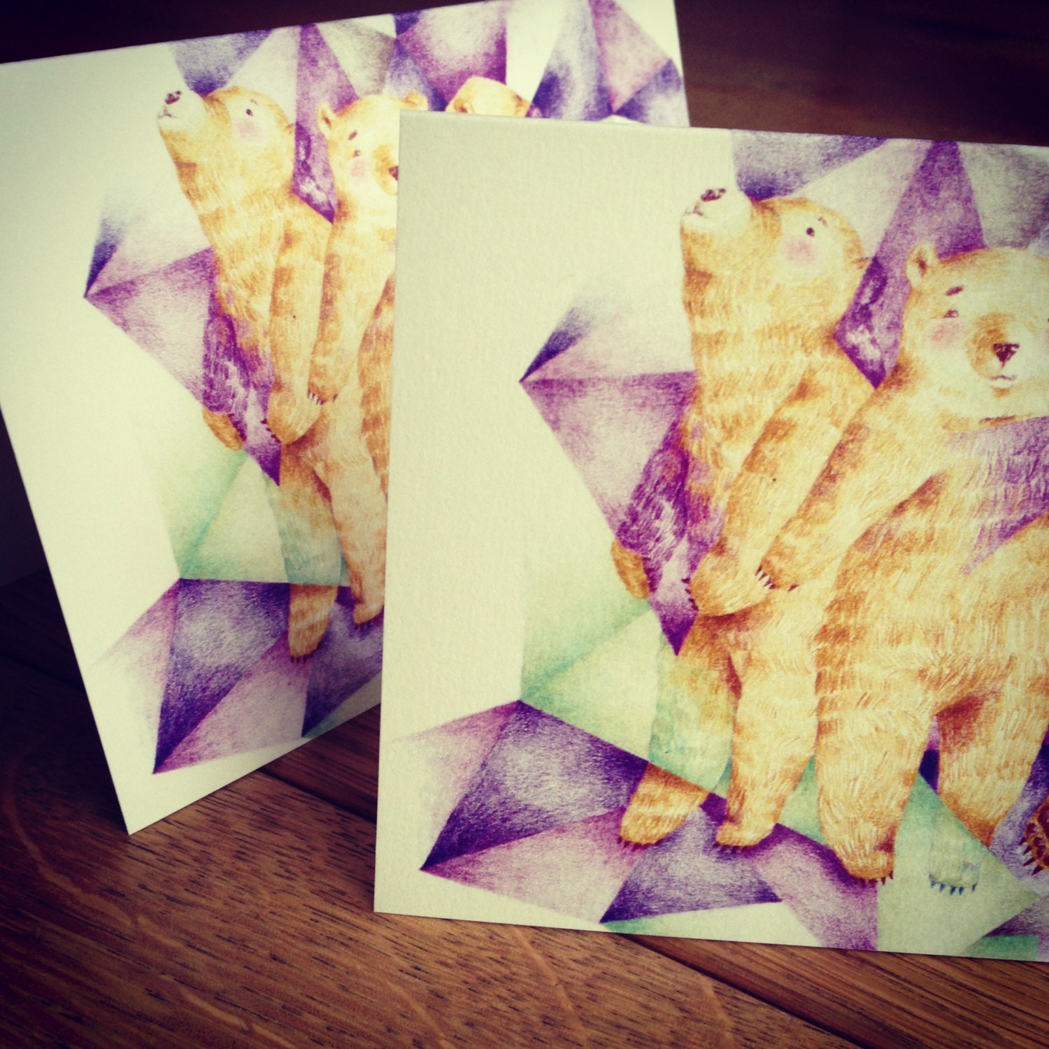 2 Pencil illustrated greeting cards (incl. envelopes) with three bears inside a graphic purple turquoise star