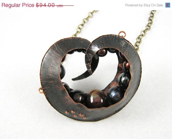 20 % VACATION SALE Fold formed copper seed pod necklace with hematite, ceramic and lampworked beads and freshhwater pearls