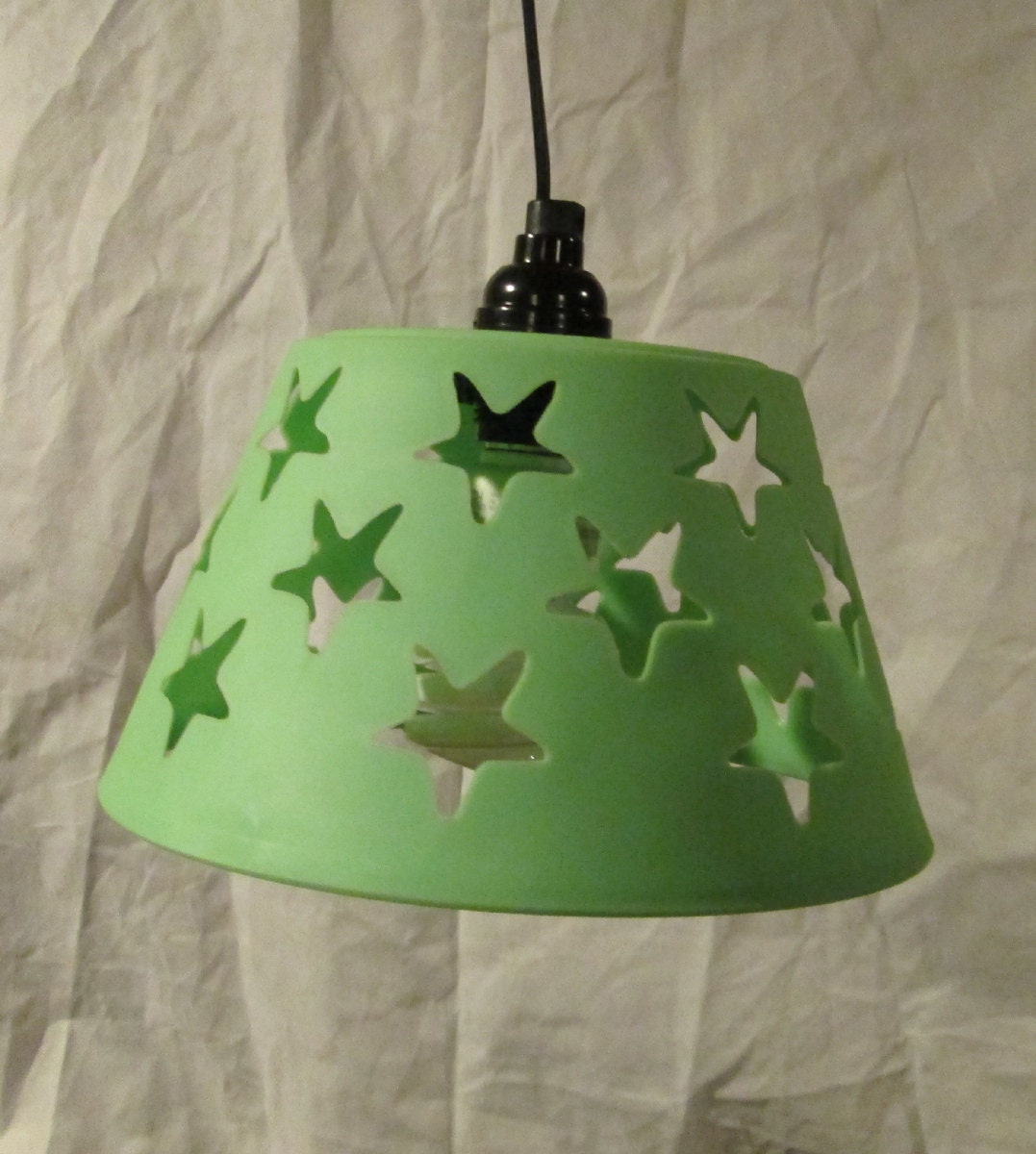 Upcycled hanging light, bright green, re-purposed, glowing green light, stars, kids room lighting