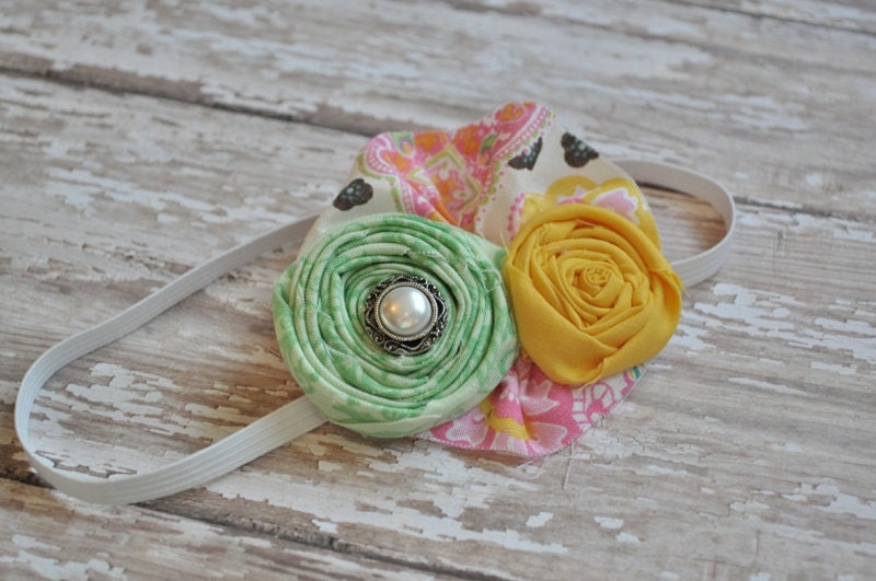 Spring is sweet. Yellow and mint green rosette headband with flower print ruffle