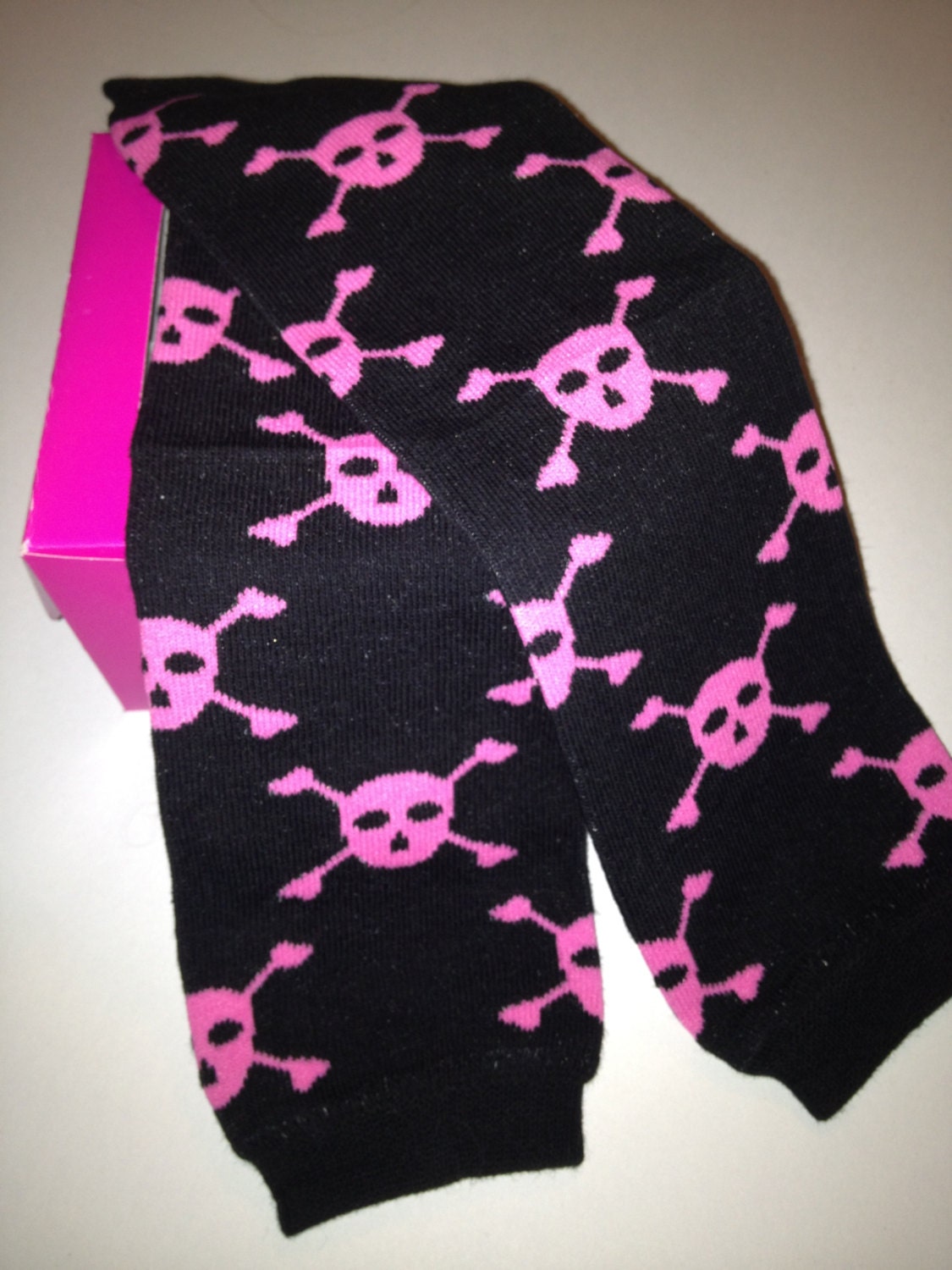 Pink Skull Leg Warmers Packaged like a Cupcake