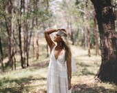 Babydoll style French lace and embroidery ivory wedding dress perfect for the bohemian vintage bride beach or garden