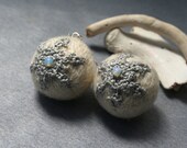 hand felted merino wool earrings in cream and grey with crochet application