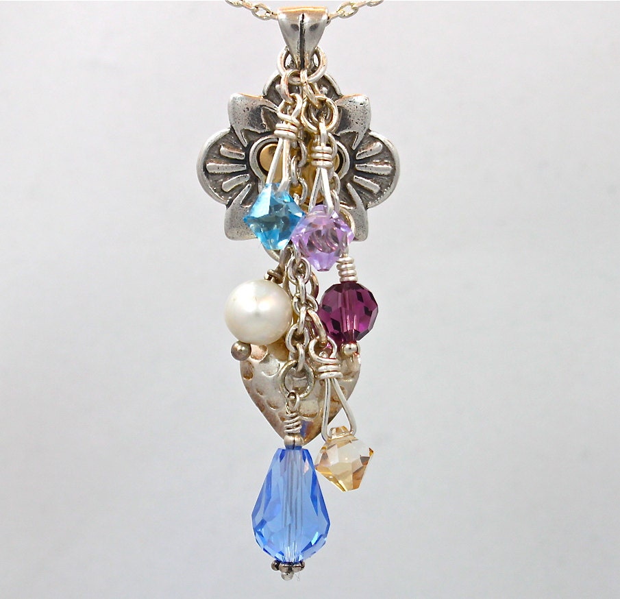 Stunning sterling charm pendant with pearls and Swarovski crystals.