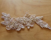 Beige floral, sequinned, beaded motif