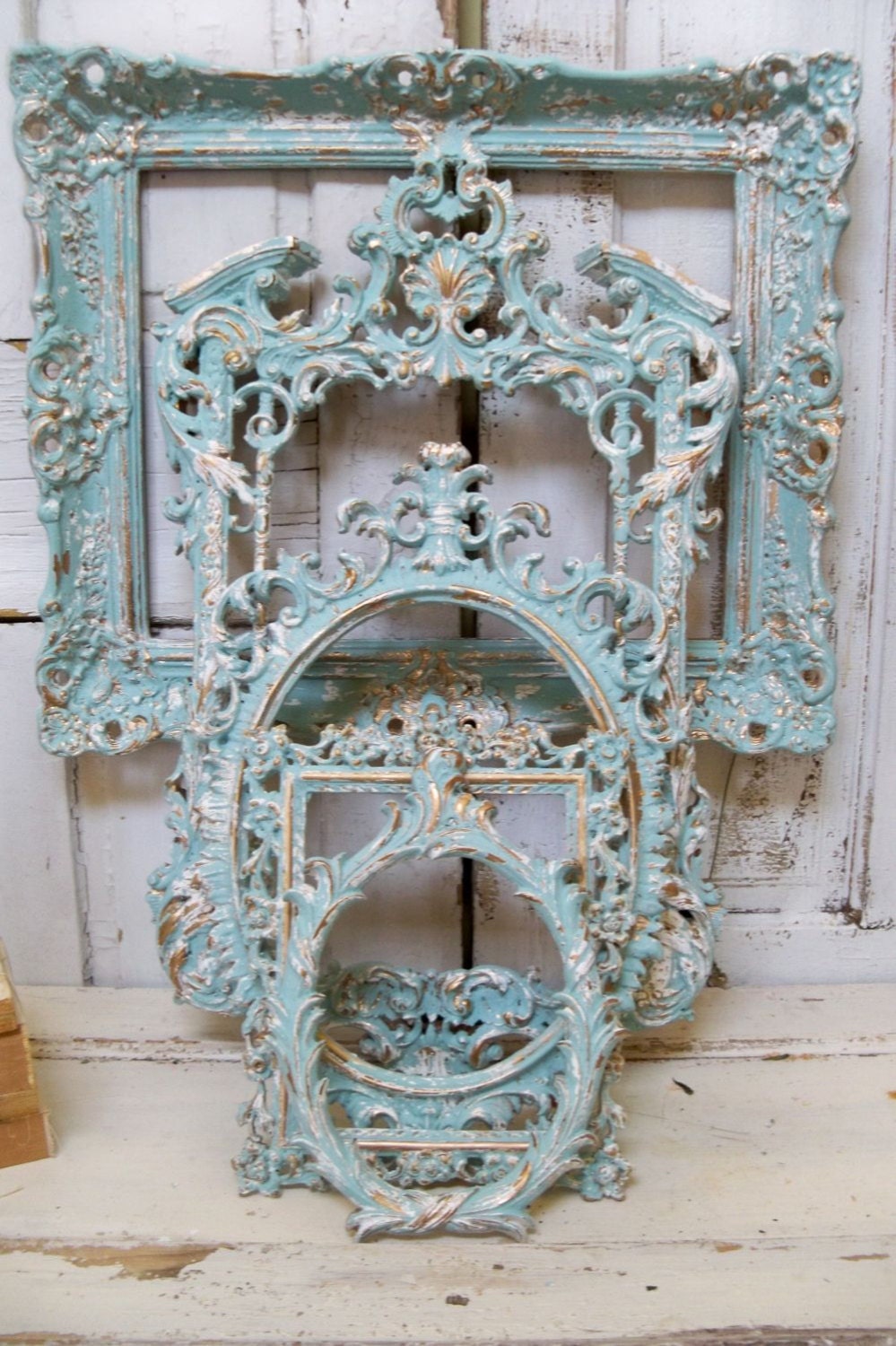 Blue ornate frame grouping hint of aqua with white accents distressed french chic wall decor Anita Spero