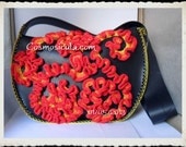 Recycled Truck Inner Tube and crochet bag, presented in the Italian TV Rai3