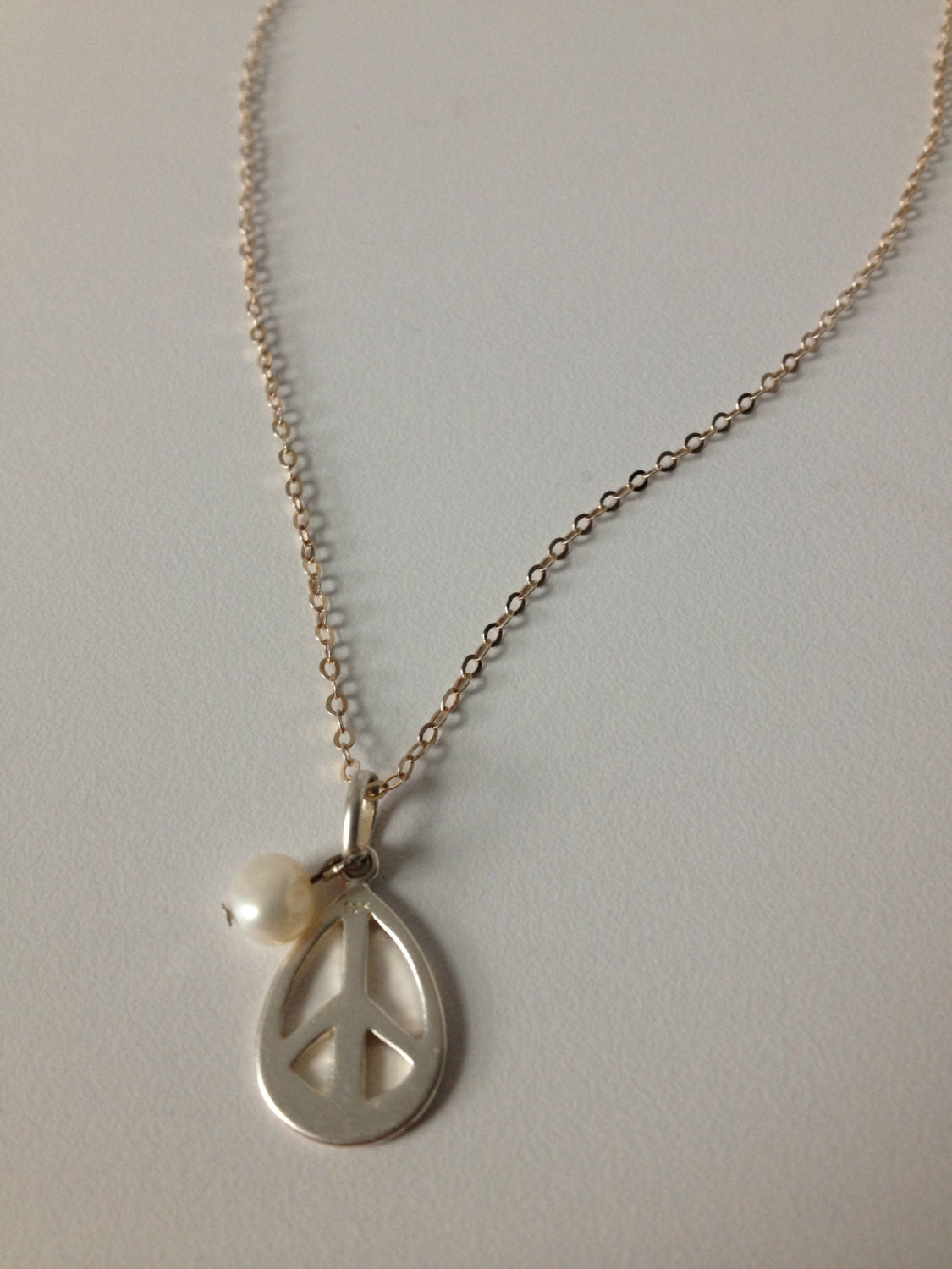 Silver teardrop peace sig...