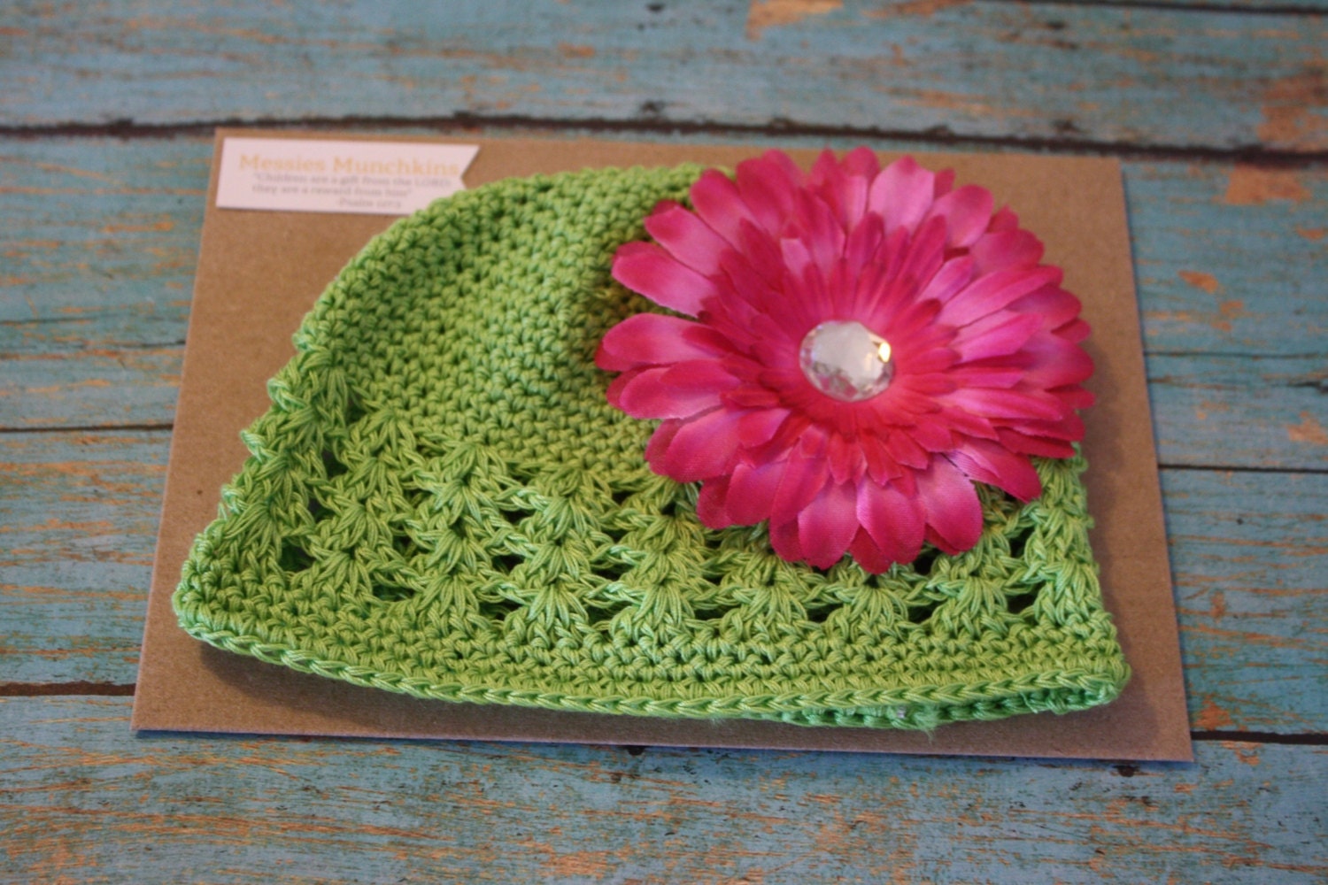 Lime green hat with pink flower