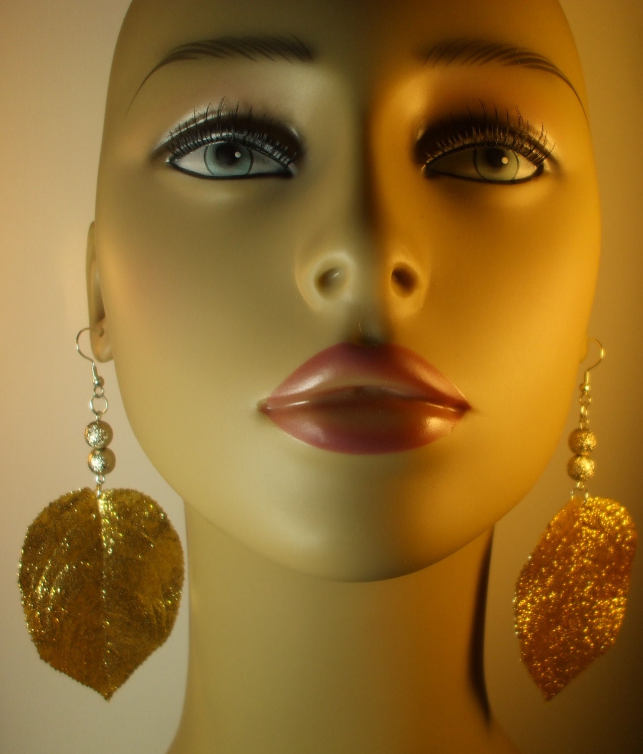 Long leaf earrings, Gold leaf dangle earrings, Gold sparkle earrings