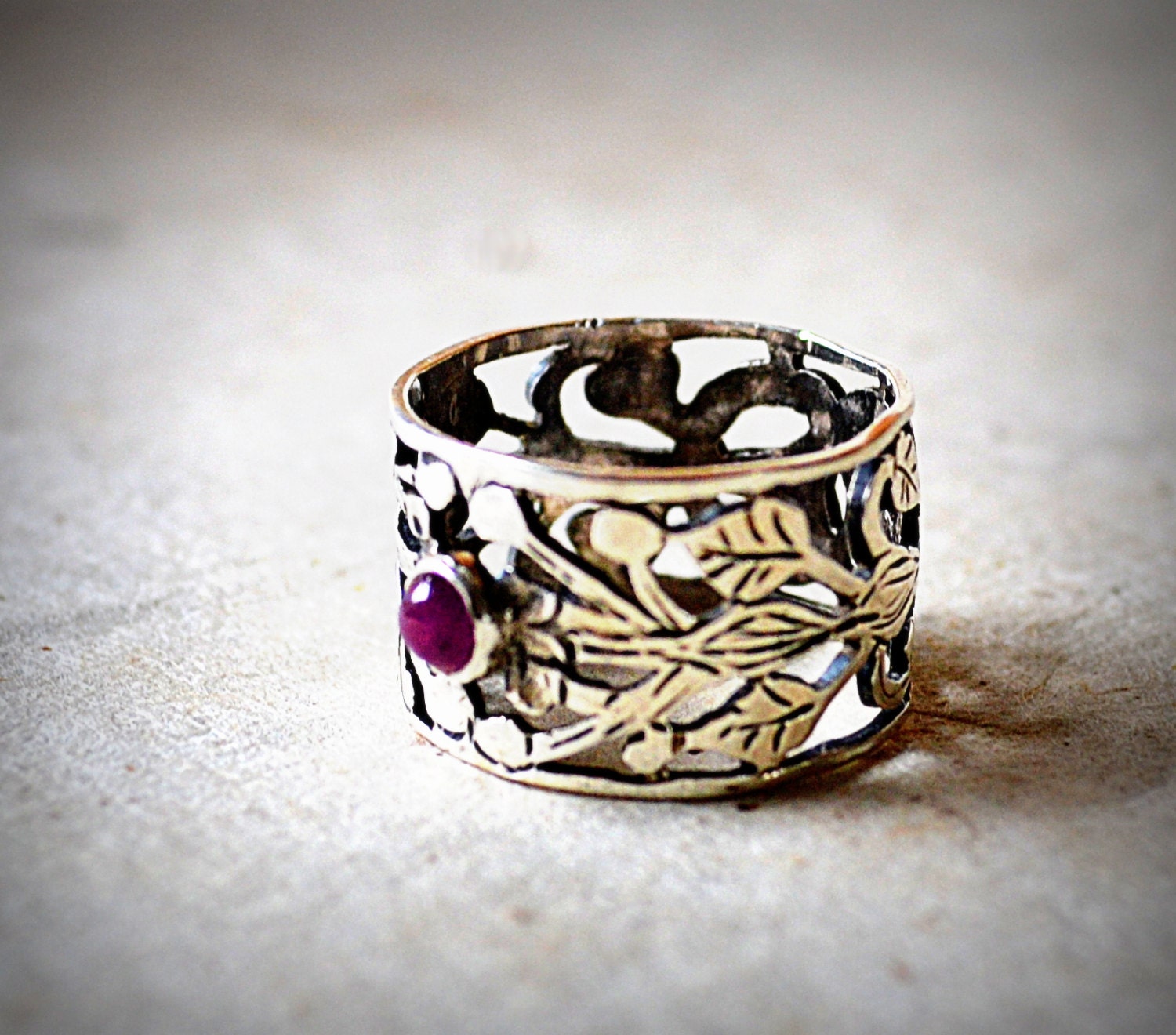 Red Ruby Ring with Silver Cut Out of Leaves and Unbreakable Knot.