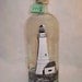 Lighthouse Handpainted Wine Bottle with Soft LED light on top.