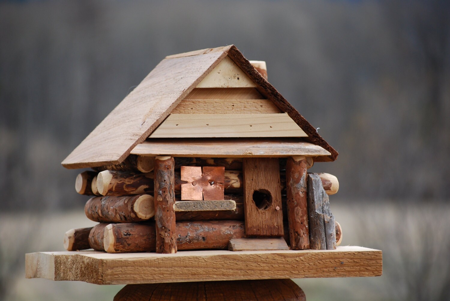 Log Cabin Bird Feeder, natural sticks and branches, fireplace accent, cedar pedestal base, copper window accent / Garden Art