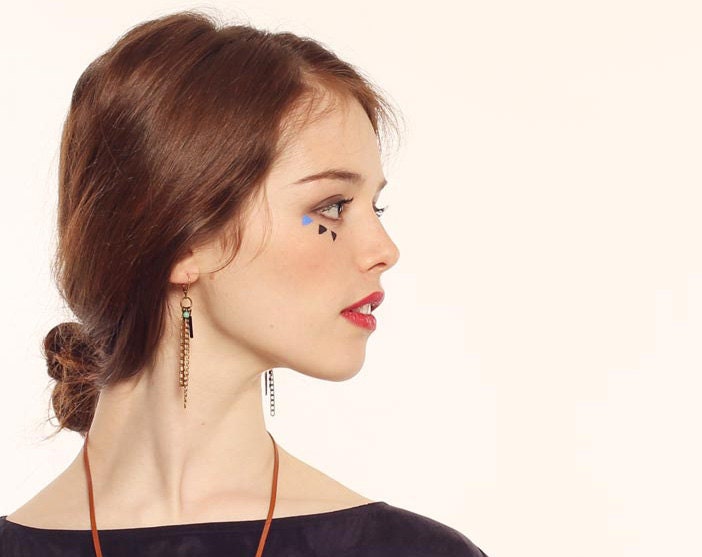 Earrings in brass sunbathes, leather and glass stones, Black, brown and turquoise blue.