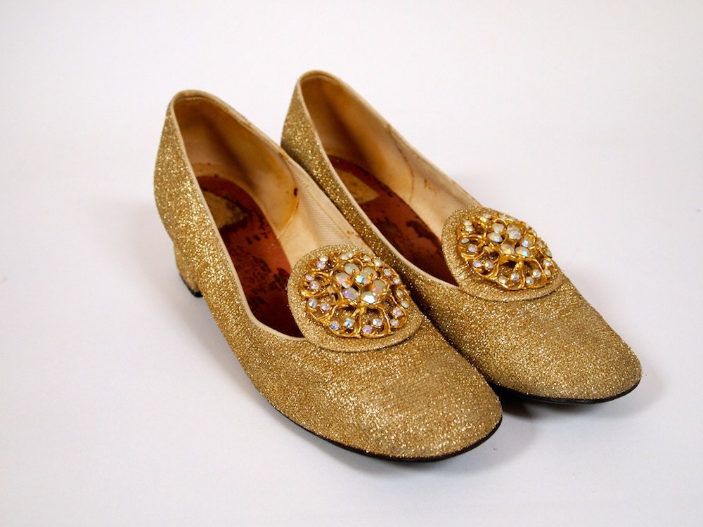 Vintage 1960s gold lurex evening shoes with low heel and rhinestone brooch embellishment on toe