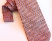 Mens Hermés Luxury Vintage silk tie with orange and lilac geometric honeycomb pattern