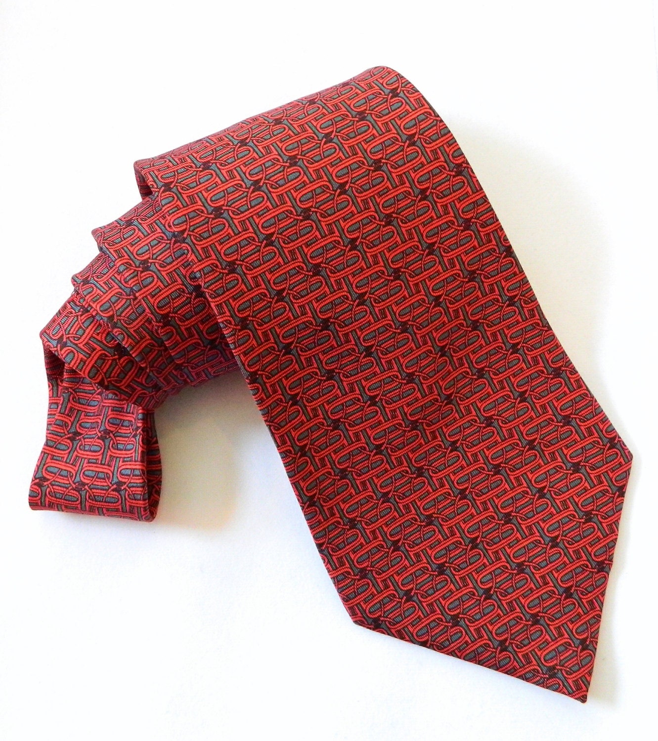 Mens Hermés Luxury Vintage Swing Style silk tie with signature iconic red abstract chain print on slate grey background