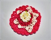 Pink crochet floral embellishment