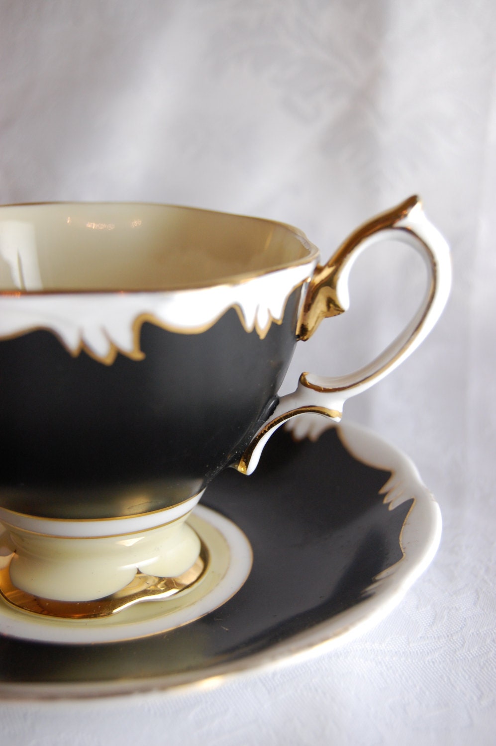 ROYAL ALBERT Stunning Black and Gold Footed Tea Cup and Saucer