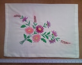 Handmade embroidered new pillow case slip, needlework, needlecraft with colourful flower motive, pattern