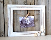 Distressed Vintage White Wooden Frame With Jute and Clothes Pin and Sea Shells