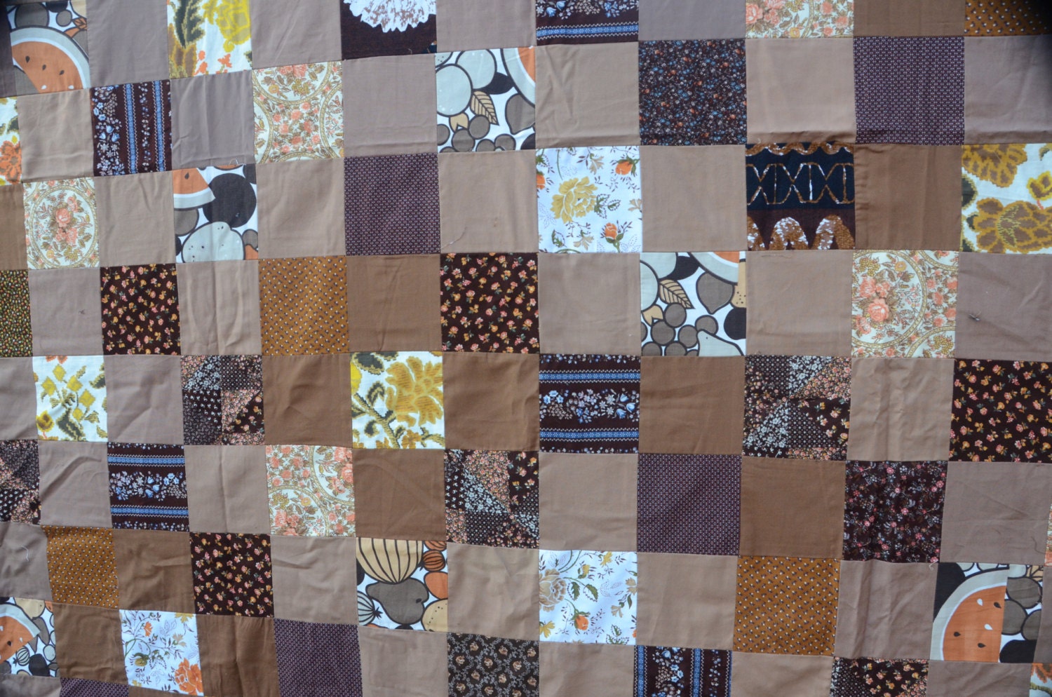Vintage King Size 92 by 108 Patchwork unfinished Quilt Top brown white tan orange yellow floral plain solid and print squares 1970s