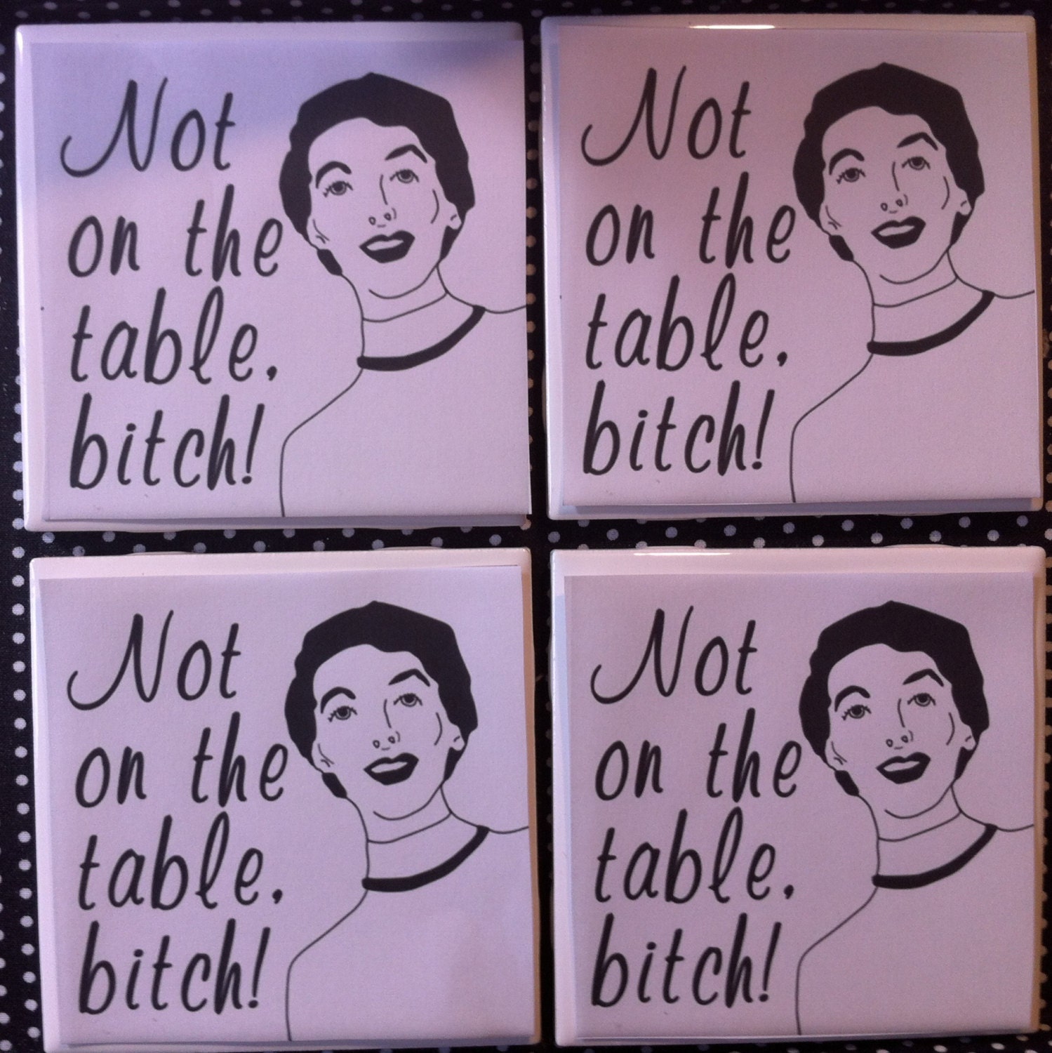 4 pack of funny drink coasters, not on the table,b