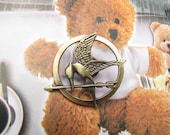 Brooch---brass The Hunger Games Inspired Mockingjay brooch with a pin at the back