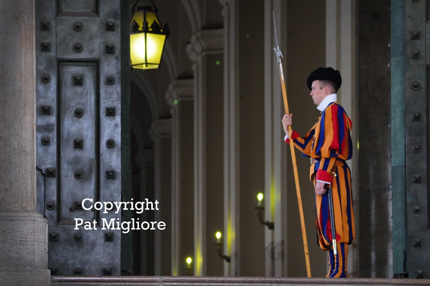 Fine Art Print Travel Photography Swiss Guard In Colorful Uniform with Row of Lights at the Vatican Rome Italy fPOE