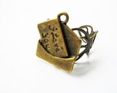 Antique golden love letter pendant ring