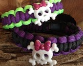Custom made Skull with pink bow paracord charm bracelets.