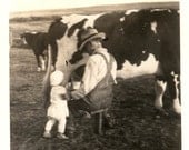 vintage photo BAby Helps Grandpa Milk the Cow