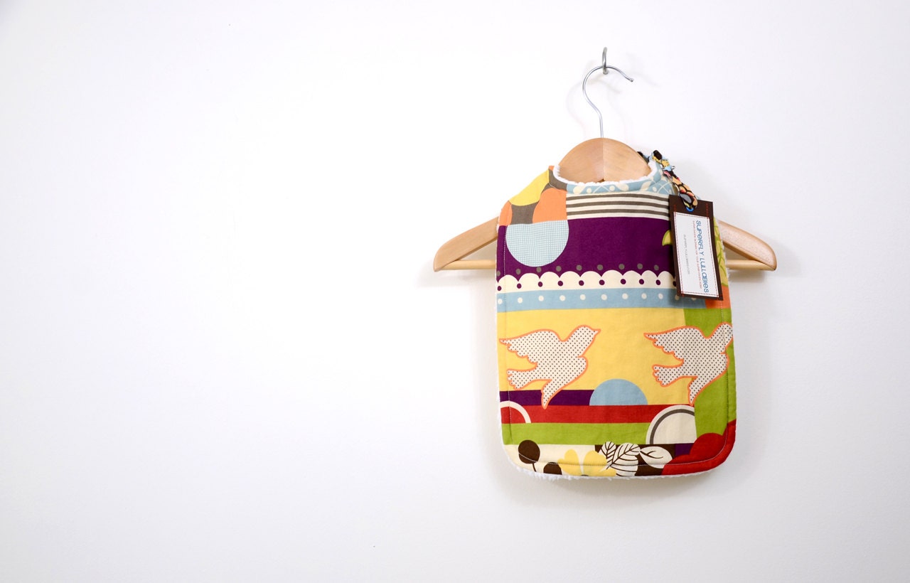 baby bib, eclectic modern and colourful design with birds and craaazy patterns, baby and adult-friendly.