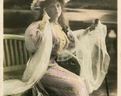 Original French vintage hand tinted real photo postcard - Actress Mabel Love sitting on a bench - Victorian Paper Ephemera
