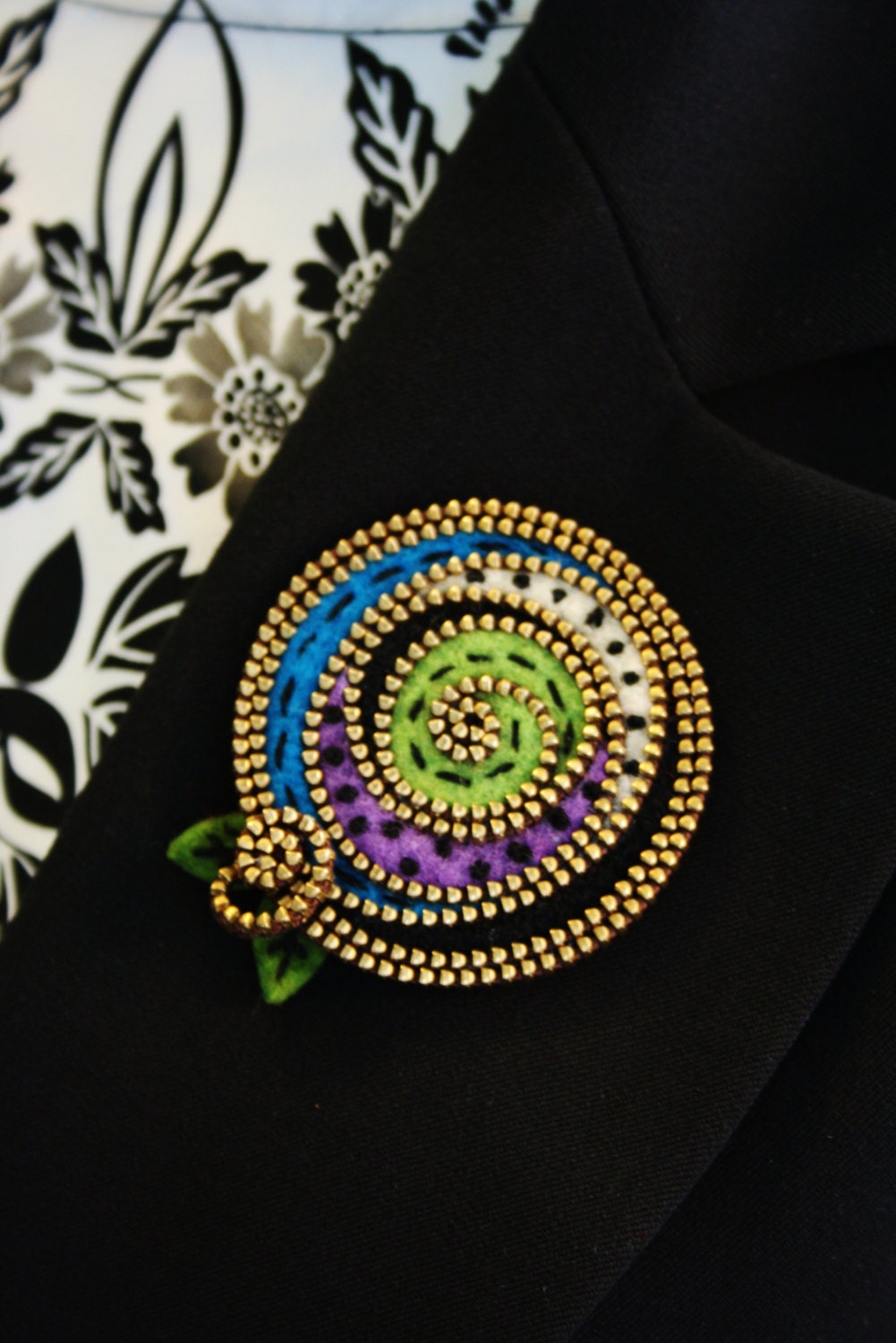 Multi colored abstract felt and zipper brooch