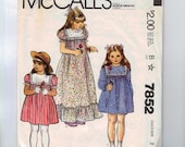 1980s Vintage Sewing Pattern McCall 7852 Girls High Waisted Yoked Ruffle Dress Size 2 Breast Chest 21 80s