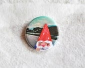 Dwarf pin illustrated button brooch