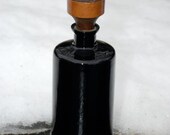 Vintage black deep purple gothic Italian bottle with brown leather stopper
