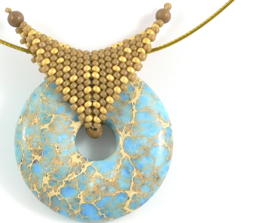 Blue and gold magnesite gemstone pendant with beaded bail
